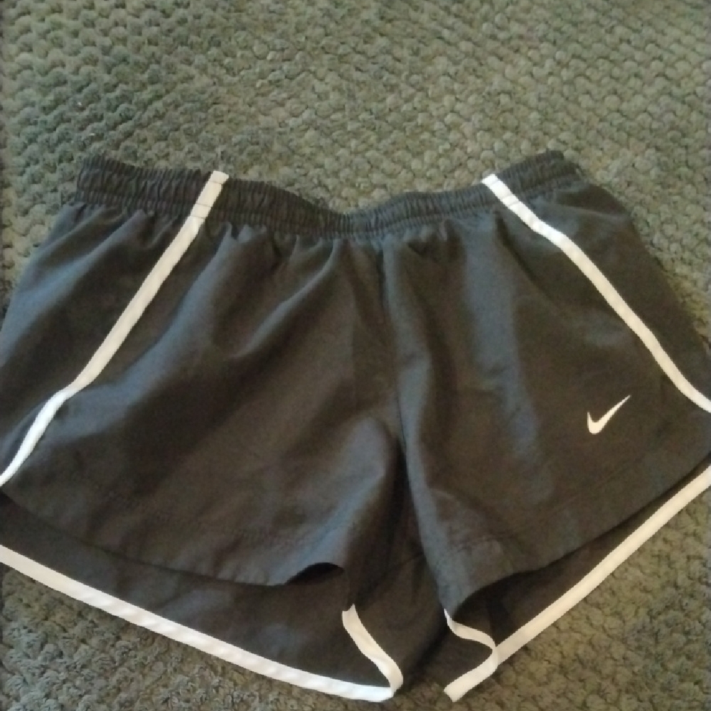 Girl's : Nike Athletic Shorts ( Size Small ) Equivalent to a size 7/8. I'm